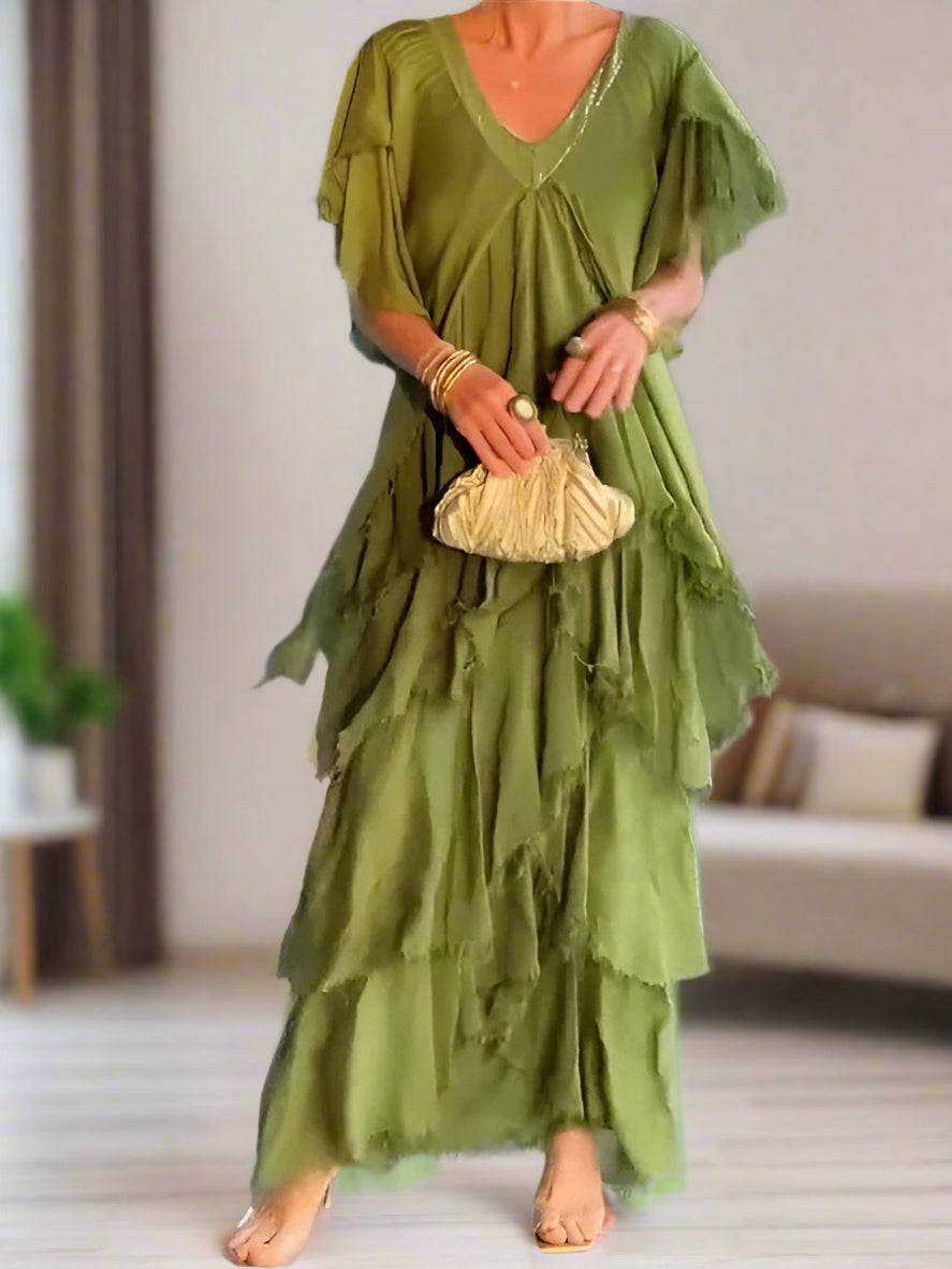 Elegantes Maxikleid mit V-Ausschnitt und mehrlagigem Rock für einen stilvollen Look
