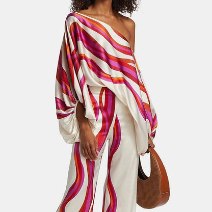Damen Jumpsuit mit einem Ärmel und weitem Schnitt im eleganten und modernen Stil