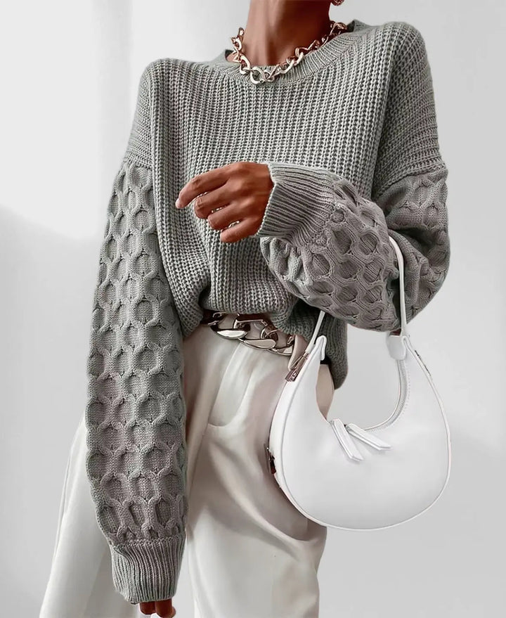 Modischer Damenpullover mit interessantem Ärmel-Design für den Herbst
