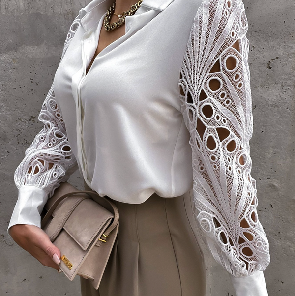 Damenbluse mit langen verzierten Ärmeln und elegantem Stil