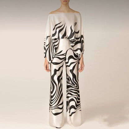 Damen Jumpsuit mit einem Ärmel und weitem Schnitt im eleganten und modernen Stil